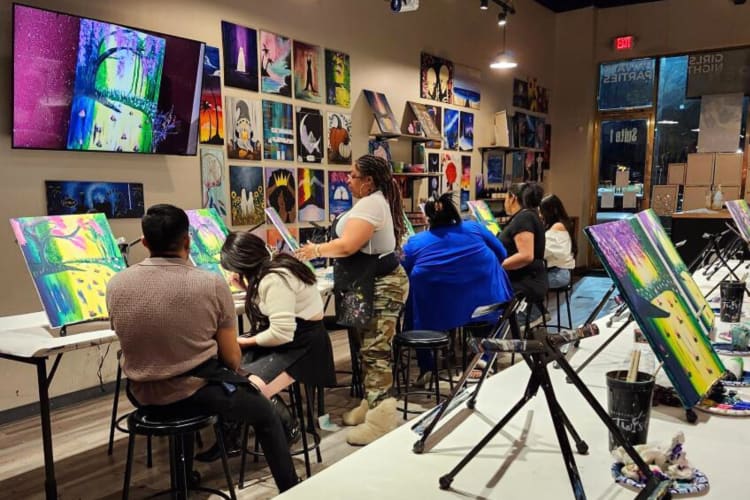People taking a class at Painting With a Twist, a fun team building activity in Las Vegas