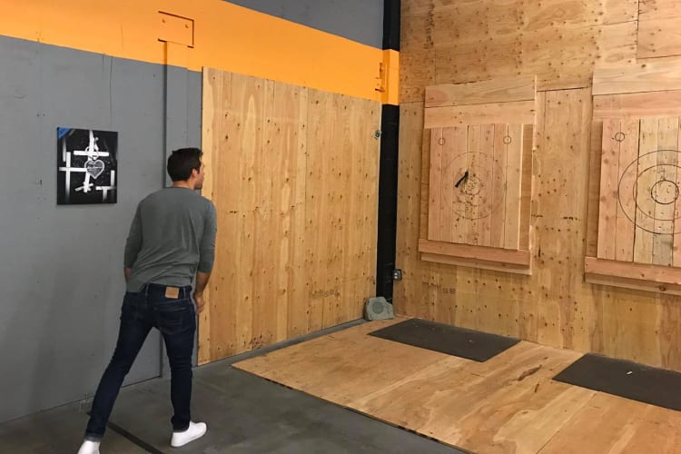 A guy throwing an axe at AxeVentures