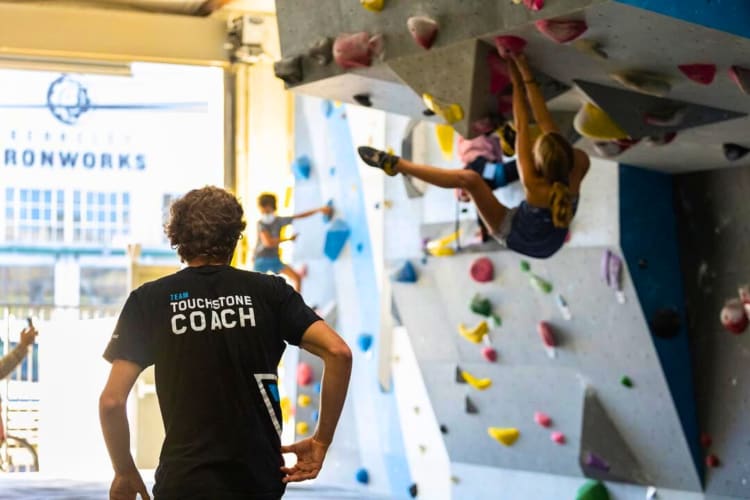 People practicing indoor climbing