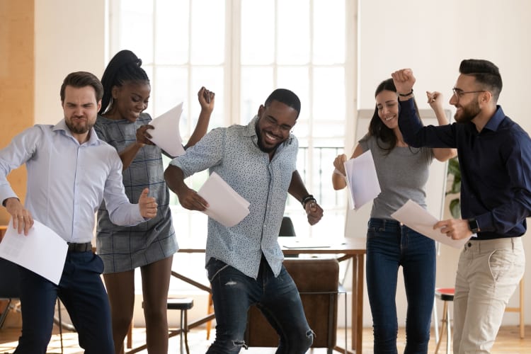 Coworkers having a dance party
