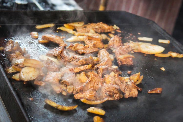 Cooking hibachi with meat