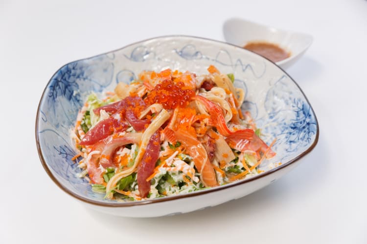 Kani salad topped with tobiko