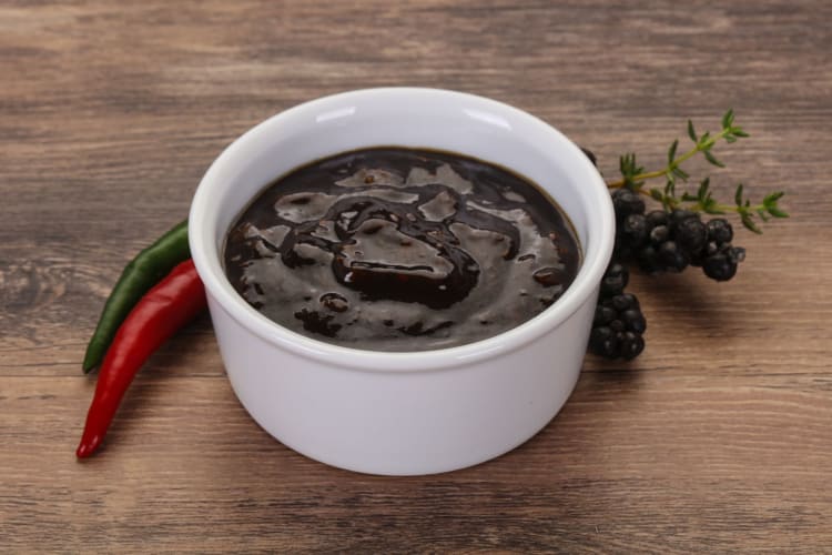 Salsa negra is a dark, almost black-colored type of hot sauce made from charred peppers.