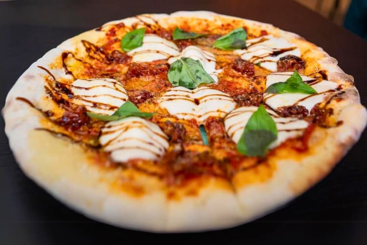 Vegan pizza with burrata