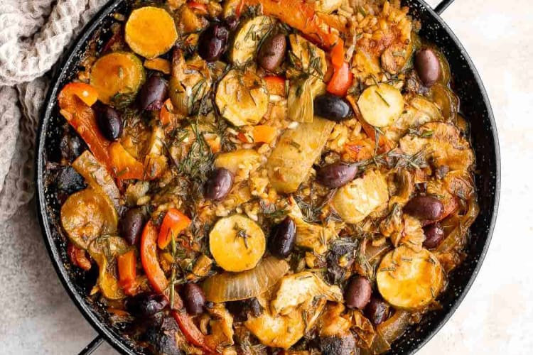 vegetarian paella features crispy rice and enticing aromatics