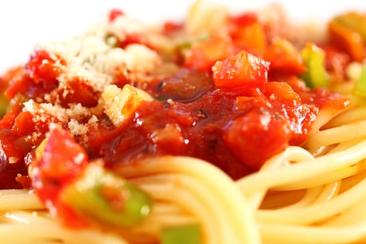 Spaghetti topped with Mexican salsa