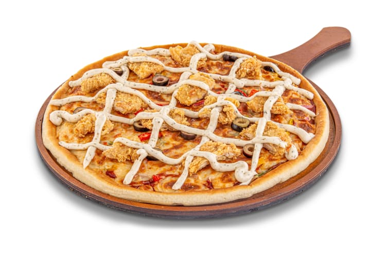 Pizza topped with ranch sauce