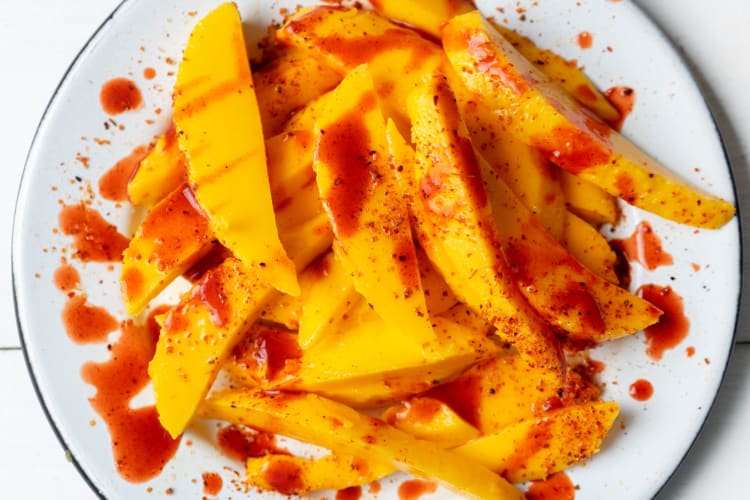 Chopped mango topped with chili powder