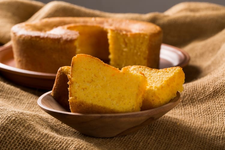 Native American tribes who invented cake for them used ground corn 