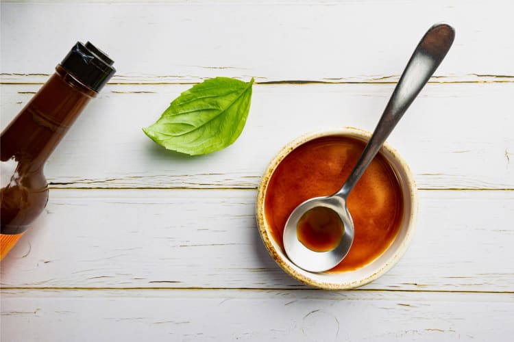 Bottle and bowl of Worcestershire sauce
