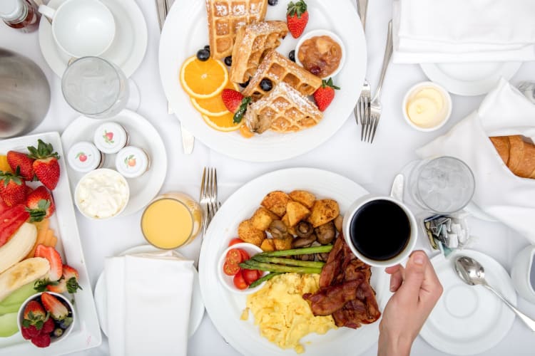 Assorted breakfast including waffled eggs and coffee