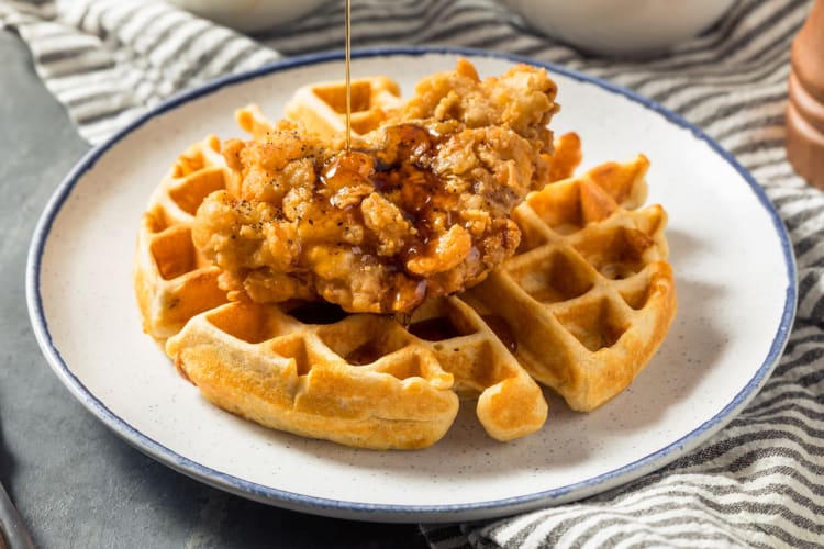 Waffles and fried chicken on a plate