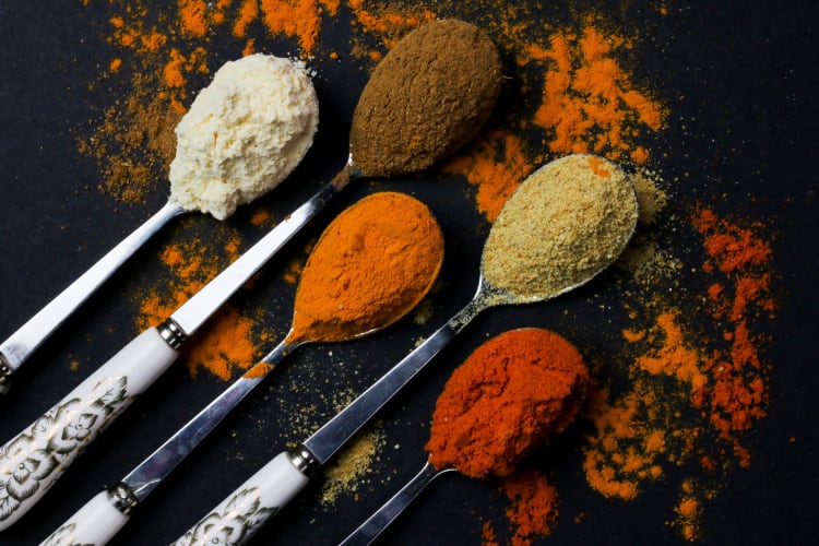 Spoons with different spices