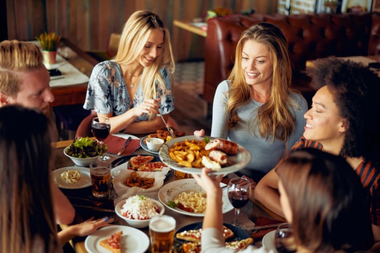 People enjoying themselves at a fancy restaurant in LA