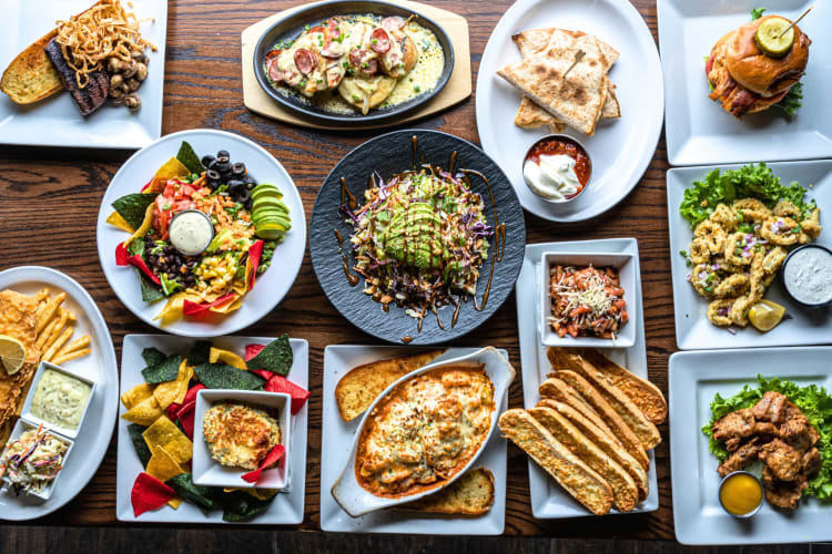 An aerial view of multiple food dishes on a table