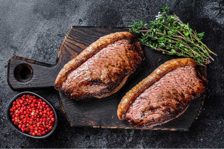 Picanha steak on a wooden cutting board