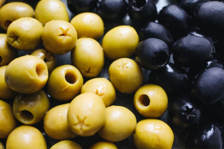 Are pitted olives really better than their unpitted counterparts?