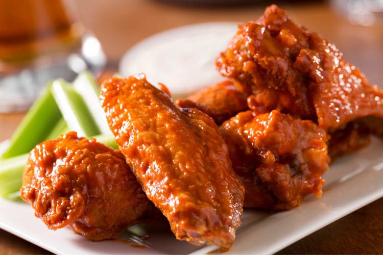 Chicken wings served with celery and ranch