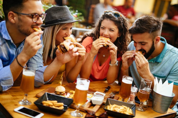 enjoying a burger and beer restaurant in Irvine