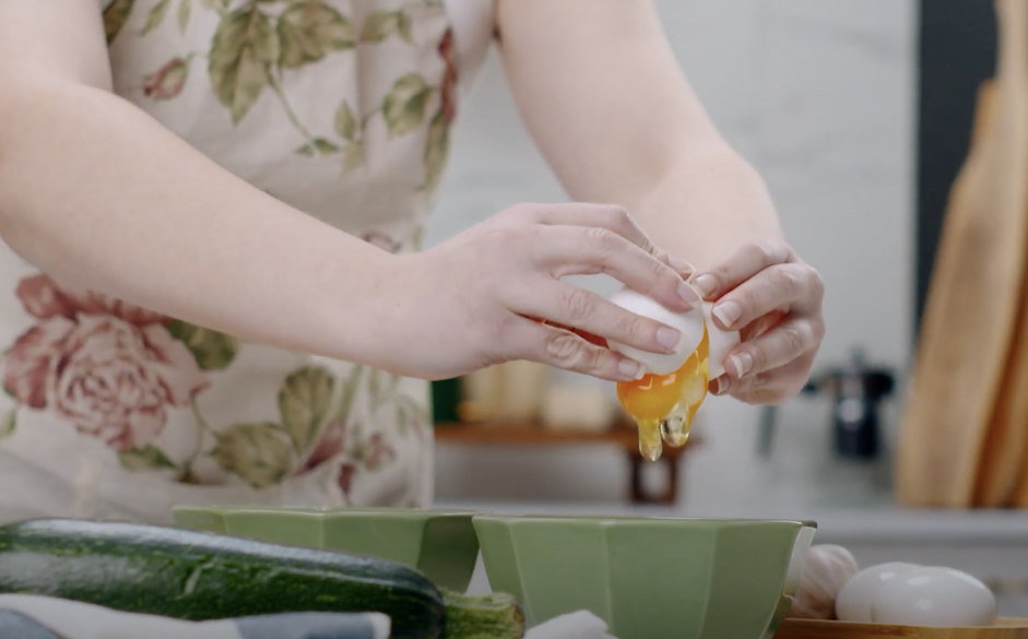 Fried Squash Recipe: Whisk together the egg and milk in a bowl.