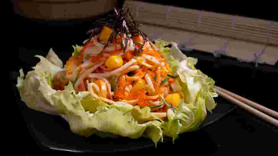 Kani Salad Recipe: Arrange salad on top of a bed of lettuce and garnish with shredded nori.