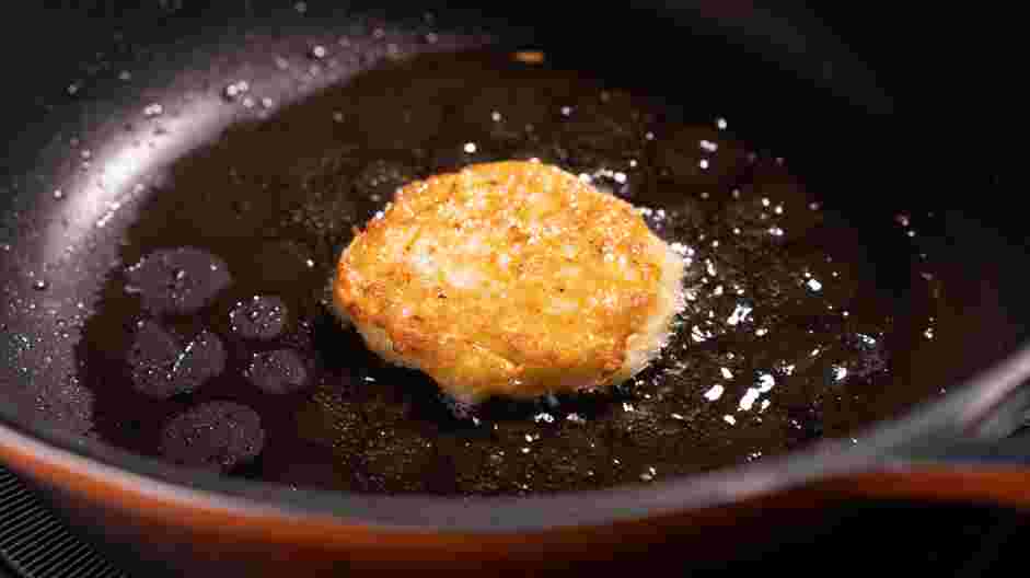 German Potato Pancakes Recipe: Heat 1/8" of oil in a large skillet until hot.