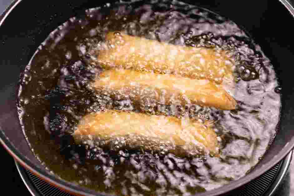 Vietnamese Egg Rolls Recipe: Heat oil in a frying pan or deep skillet to 350°F.