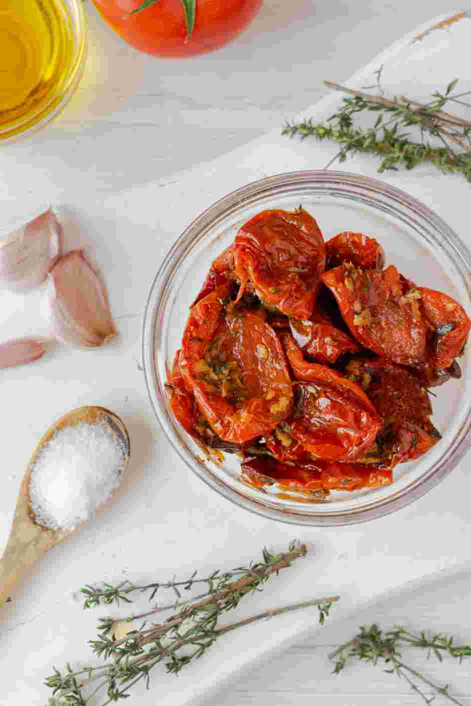 Tomato Confit Recipe: Store them in a container and cover them with olive oil once cooled and they can stay refrigerated for a week.