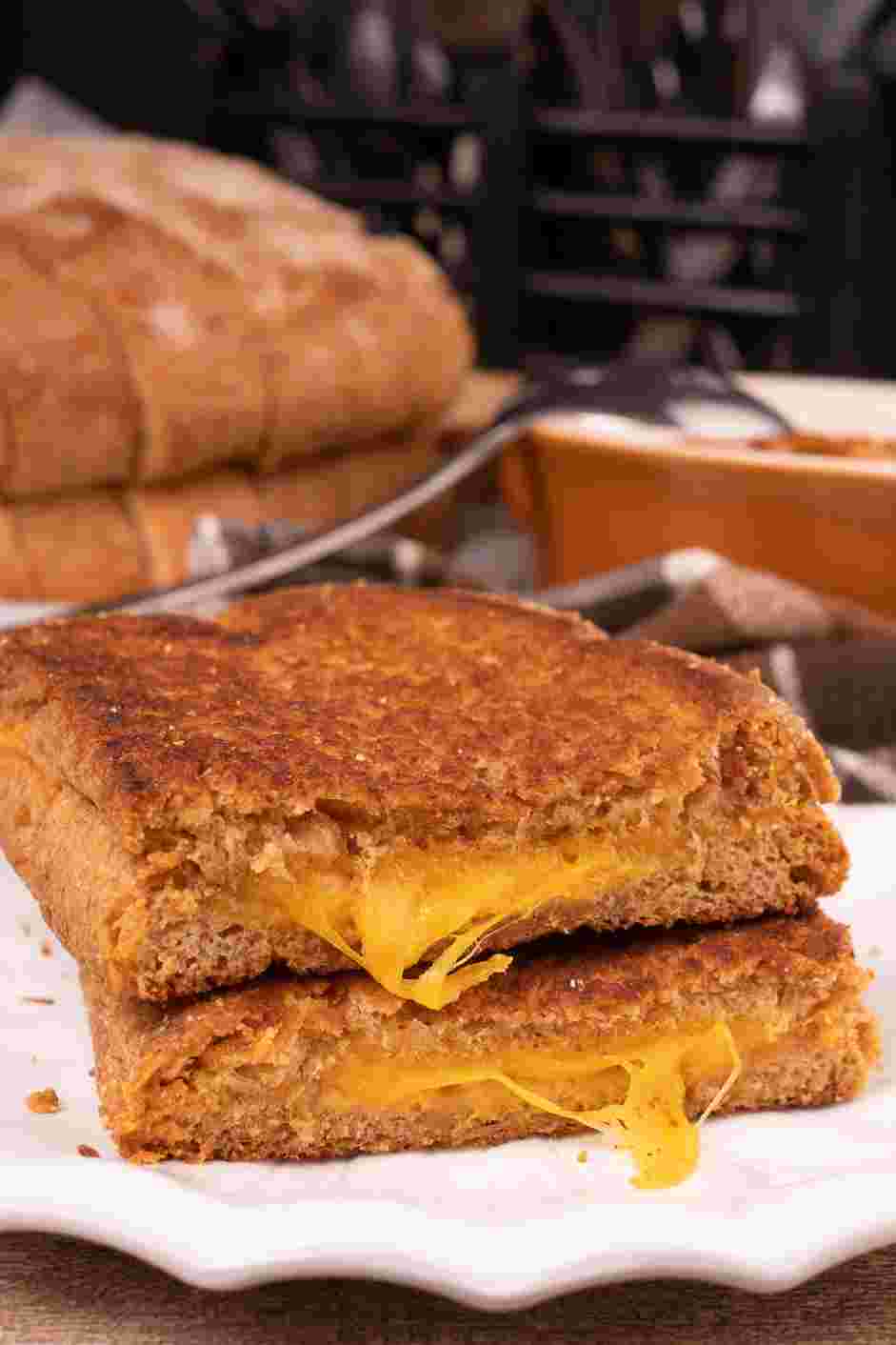 Air Fryer Grilled Cheese Recipe: Flip sandwich and cook for another 5 minutes.