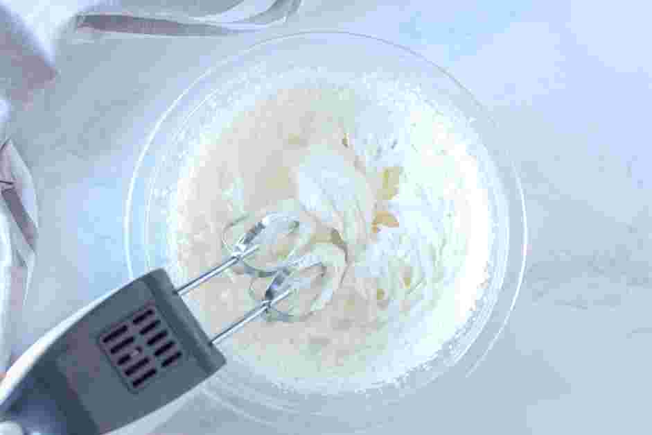 German Spaghetti Ice Cream Recipe: In a bowl, whip the cream until medium-soft peaks are formed.