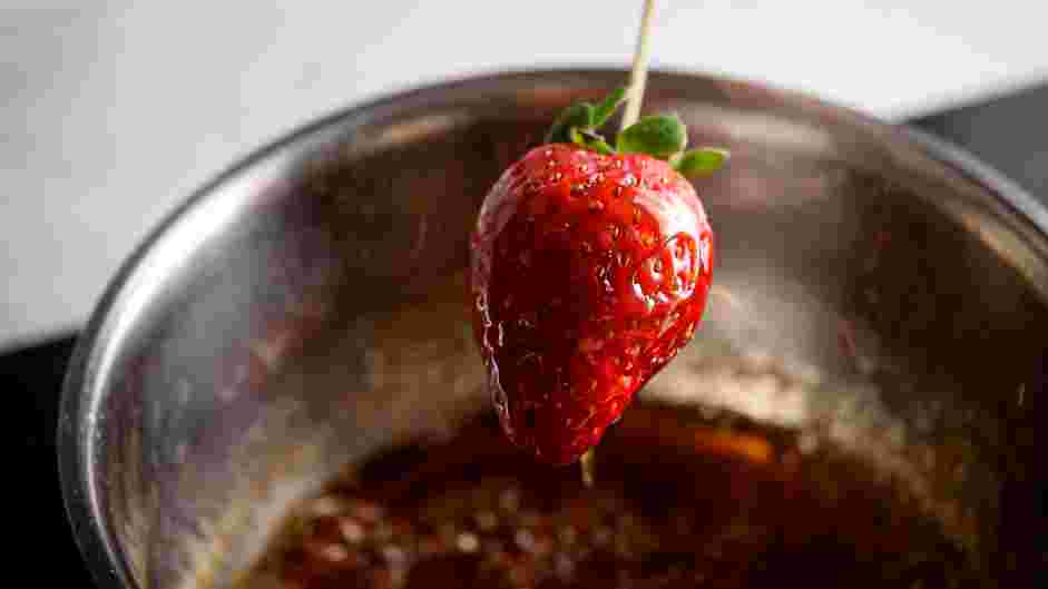 Candied Strawberries Recipe: Carefully dip strawberries one strawberry at a time, swirling them in the sugar and coating them on every side.