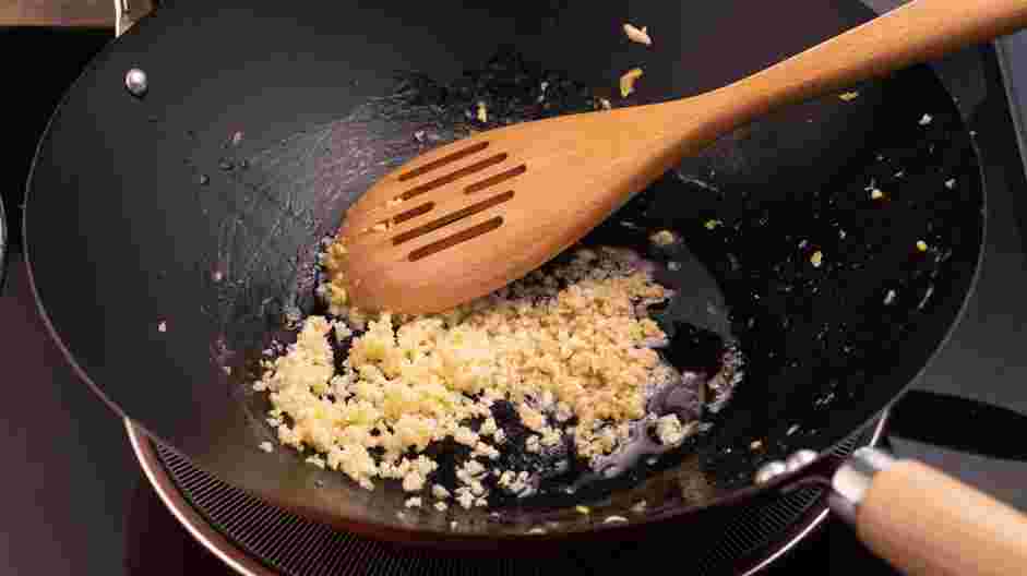 Crab Fried Rice Recipe: Add another tablespoon of sesame oil to the same skillet.