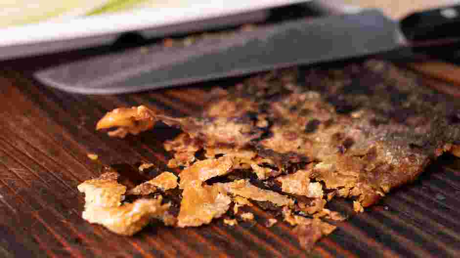 Salmon Skin Roll Recipe: Chop reserved salmon skin and toss with togarashi in a bowl.