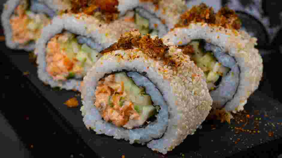 Salmon Skin Roll Recipe: Slice each sushi roll into 6 pieces and transfer to a serving platter.