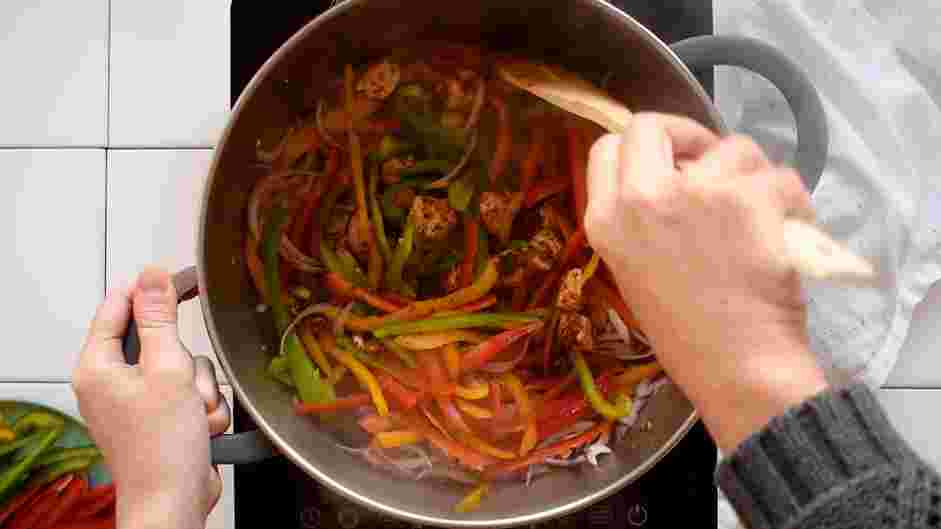 Rasta Pasta Recipe: Add the onion powder, garlic powder, paprika, red pepper flakes, ground cumin, cinnamon and oregano and stir to coat the chicken.