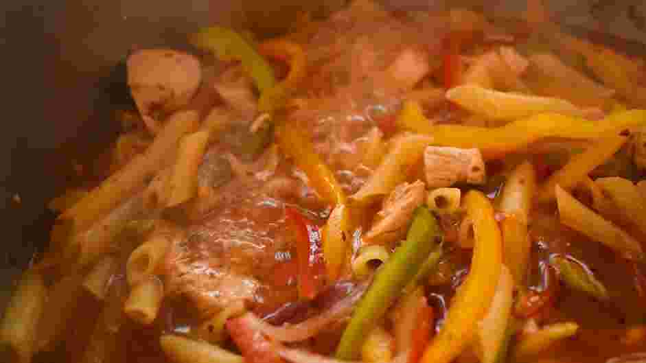 Rasta Pasta Recipe: Add pasta and chicken broth, and simmer for 12-15 minutes or until the pasta is al dente.