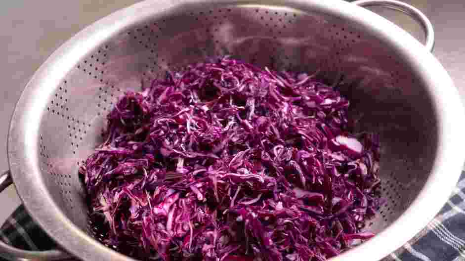 Pickled Red Cabbage Recipe: After salting, transfer the shredded cabbage to a colander or pasta strainer (positioned over an empty mixing bowl).