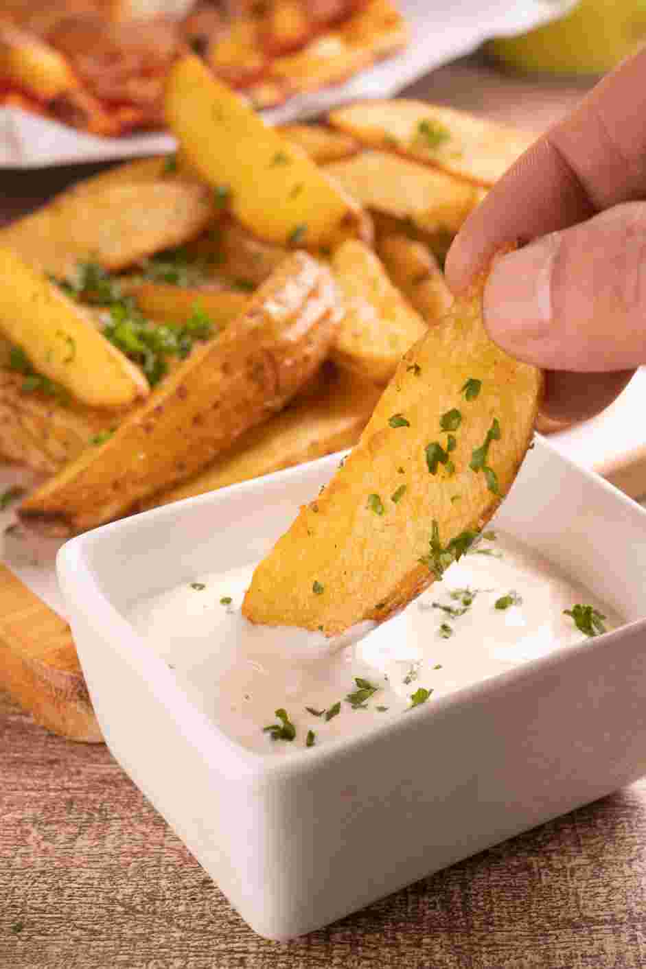 Air Fryer Potato Wedges Recipe: Serve hot with sour cream or your favorite dip on the side.