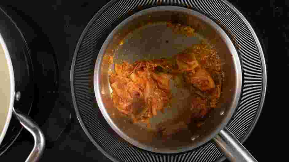 Korean Ramen Recipe: In a separate pot, heat 2 tablespoons of sesame oil.