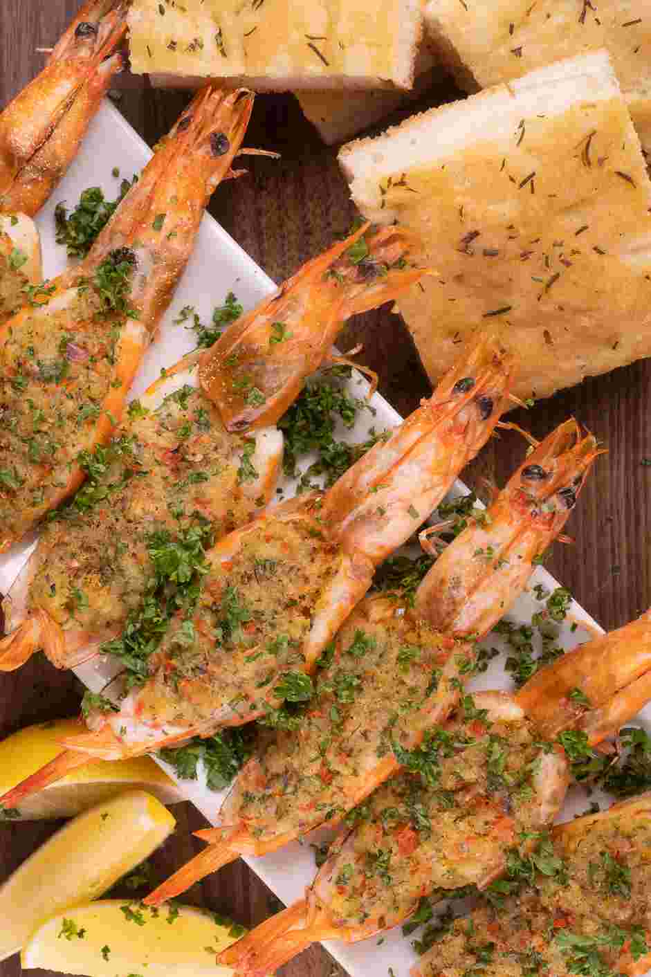 Baked Stuffed Shrimp Recipe: Squeeze some lemon juice over the baked stuffed shrimp.