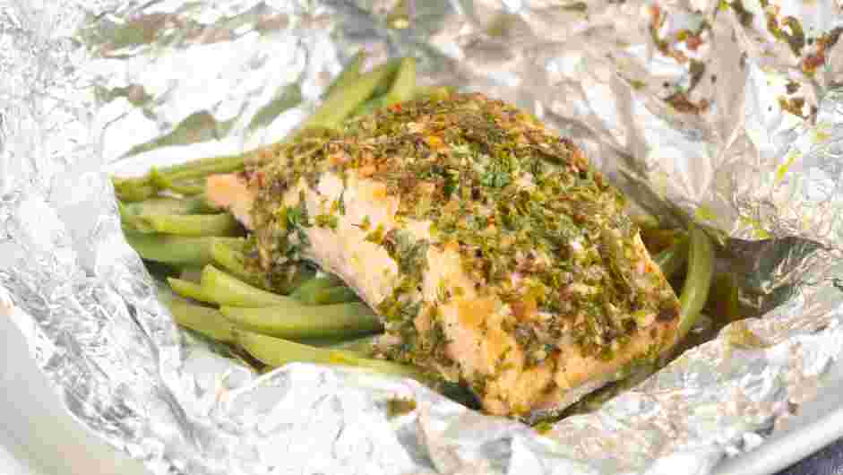 Instant Pot Salmon Recipe: Unwrap the packets and drizzle the cooking juices over the salmon and beans.