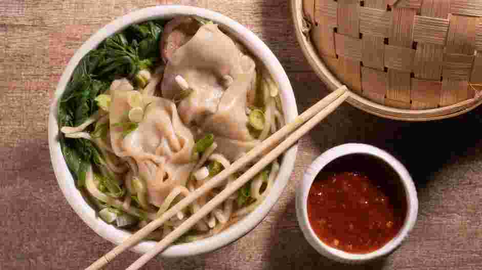 Wonton Noodle Soup Recipe: Arrange noodles in serving bowls.