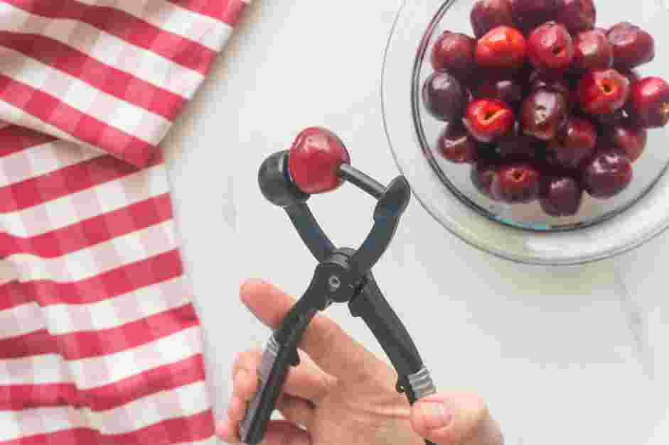 Candied Cherries Recipe: Using a cherry pitter or a knife, remove the pits from the cherries.