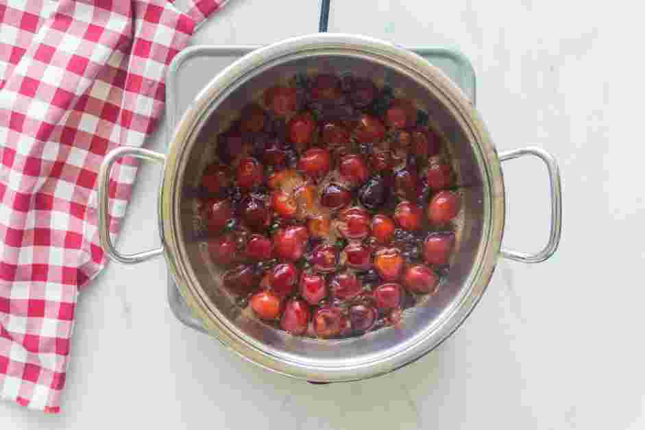 Candied Cherries Recipe: Place the cherries in a 2-quart saucepan.