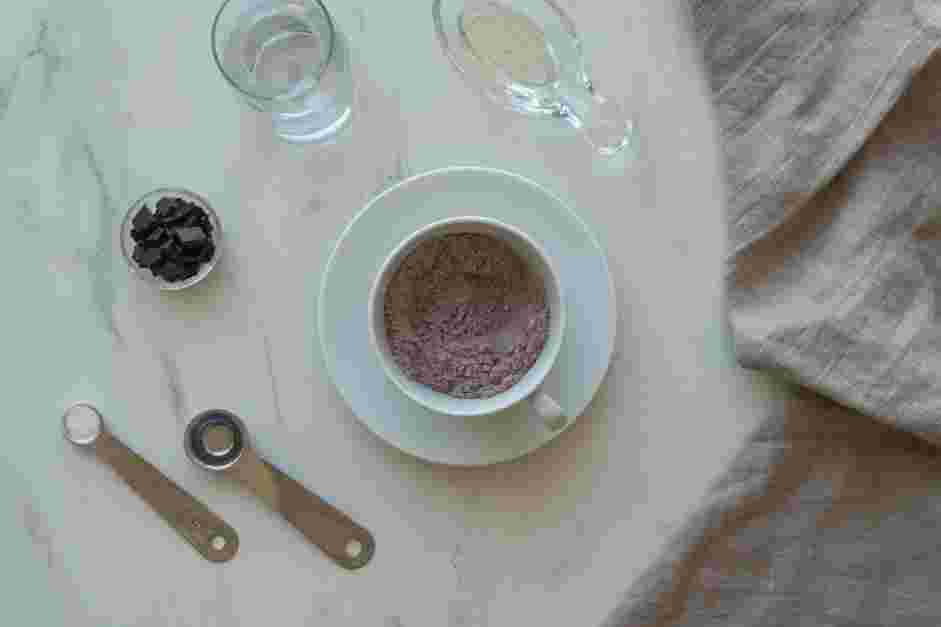 Vegan Mug Cake Recipe: Whisk together the flour, sugar and cocoa in the mug.