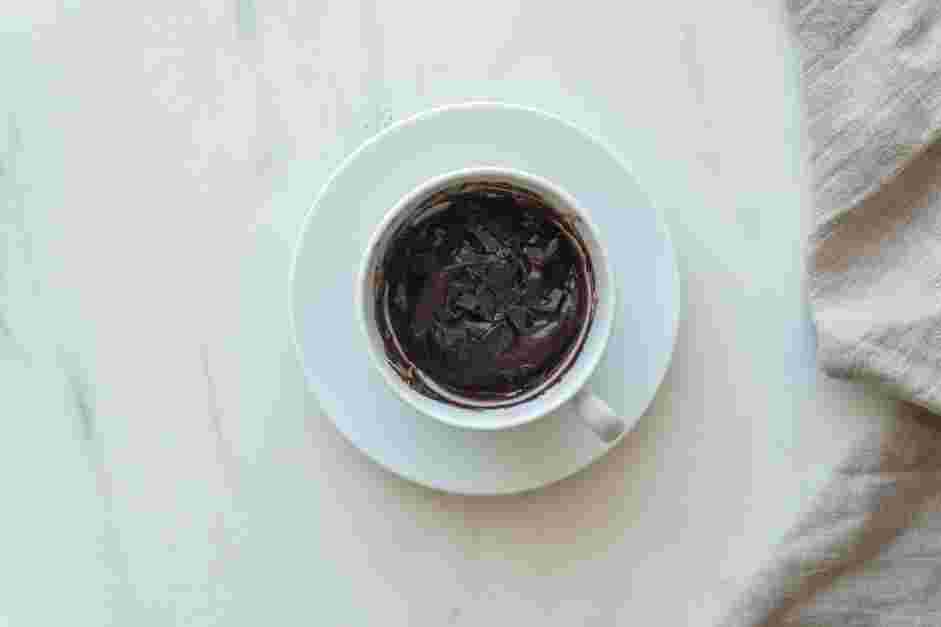 Vegan Mug Cake Recipe: Stir in the vegetable oil and the water, followed by the chocolate chips.