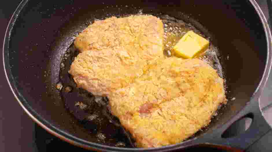 Keto Chicken Parmesan Recipe: In a large skillet or frying pan (nonstick is ideal), heat 1/2" of oil over medium-high heat.