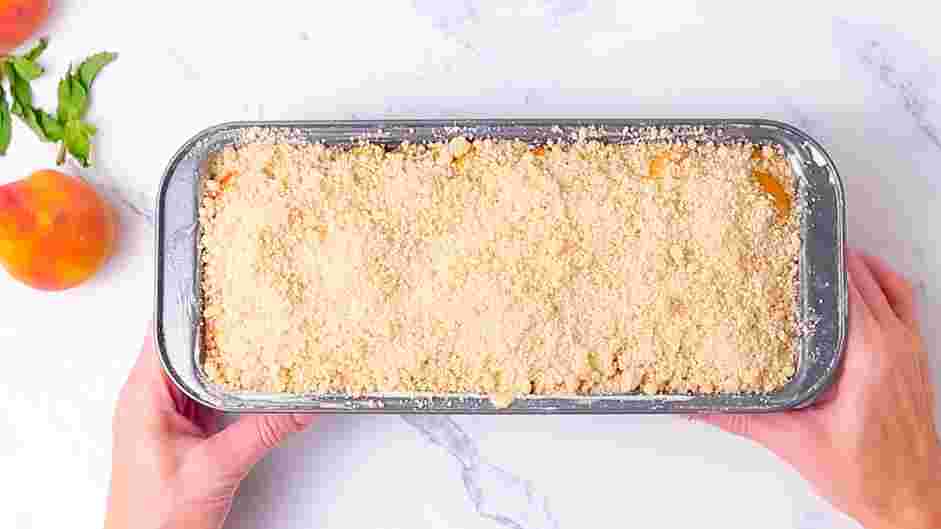 Peach Cobbler Pound Cake Recipe: Make the streusel topping by combining the butter, sugar, vanilla and flour until a crumble texture forms.