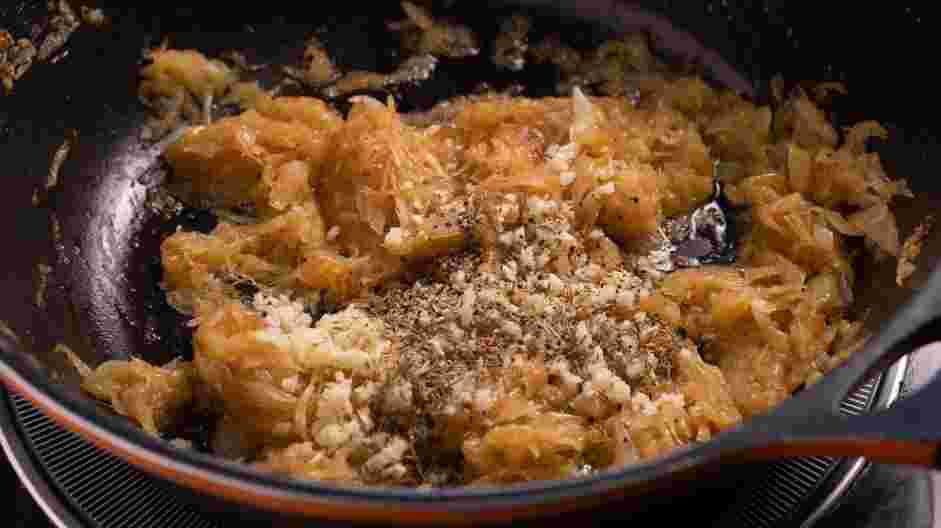 Vegetarian French Onion Soup Recipe: Add garlic, dried thyme and black pepper.