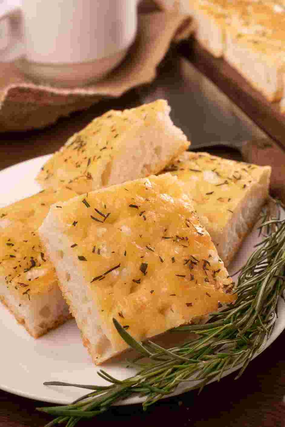 Rosemary Focaccia Recipe: Let the focaccia cool on a wire rack for five minutes before cutting and serving.